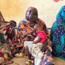 World News in Brief: Famine in Sudan, 400,000 now in Syria from Lebanon, women in the military, olive farmers in Palestine