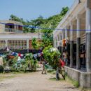 Desks become beds as Haitian school shelters people displaced by violence